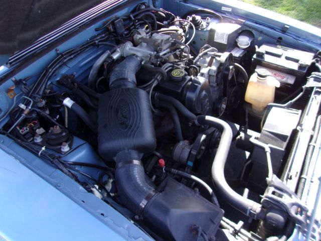 1990 pacific blue Ford Mustang Hatchback