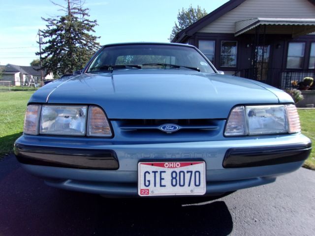1990 pacific blue Ford Mustang Hatchback