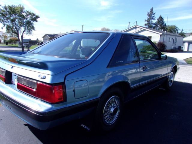 1990 pacific blue Ford Mustang Hatchback