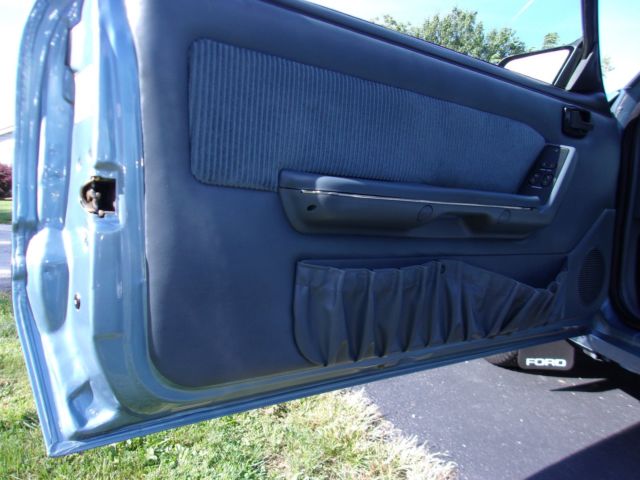 1990 pacific blue Ford Mustang Hatchback