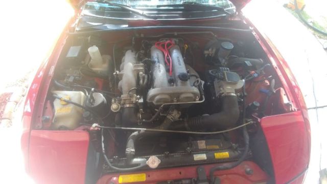 1990 Red Mazda MX-5 Miata Convertible