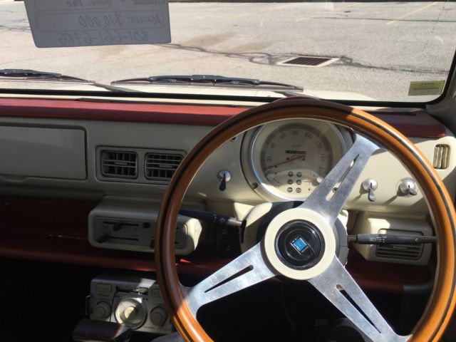 1980 cream Nissan Other