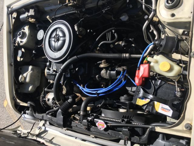 1980 cream Nissan Other