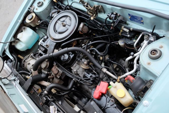 1990 Blue Nissan Pao Hatchback