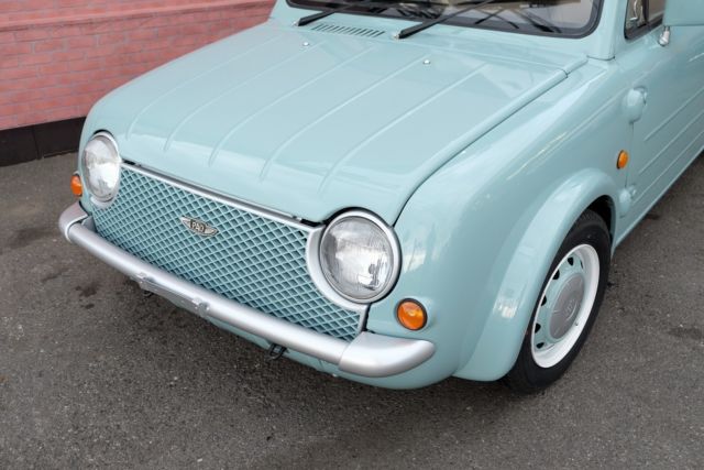 1990 Blue Nissan Pao Hatchback