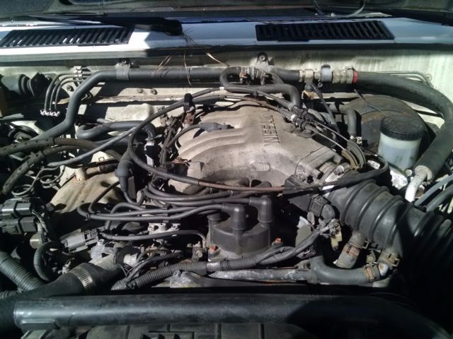 1990 White Nissan Pathfinder SUV