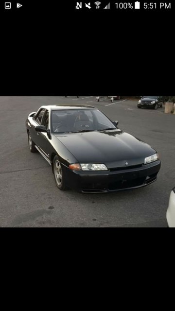 1990 Black-Gray Nissan GT-R 4-DOORS