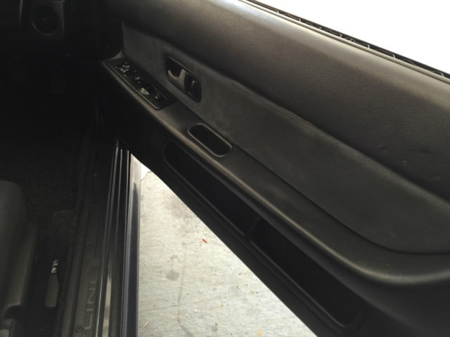 1990 Gunmetal Nissan GT-R Coupe