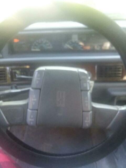 1990 Red Oldsmobile Ninety-Eight 4 door