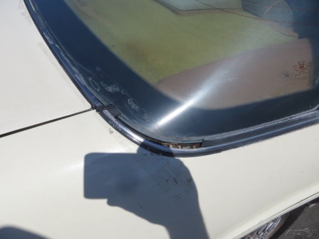 1990 Tan Oldsmobile Cutlass Sedan