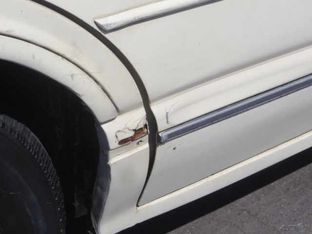 1990 Tan Oldsmobile Cutlass Sedan