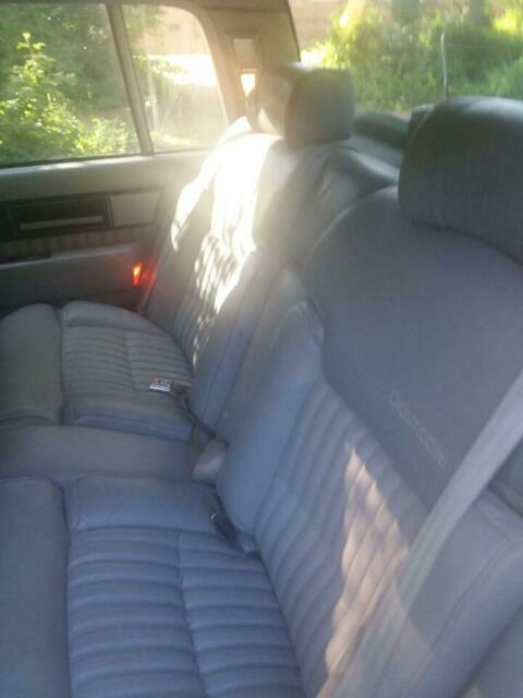 1990 Red Oldsmobile Ninety-Eight 4 door