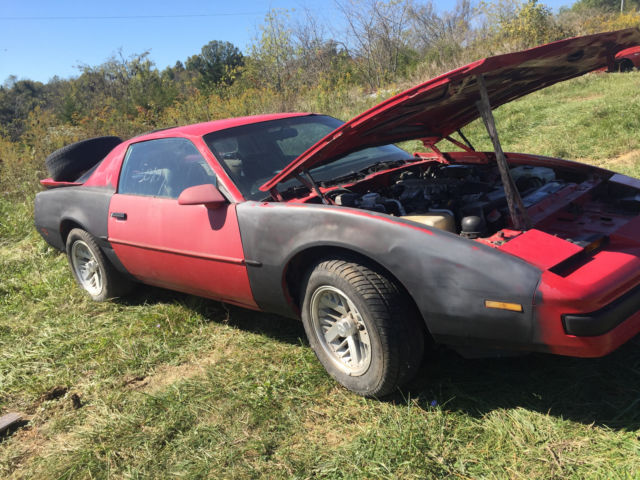 1990 Red Pontiac Firebird Hatchback