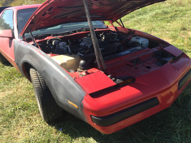 1990 Red Pontiac Firebird Hatchback