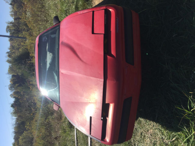 1990 Red Pontiac Firebird Hatchback