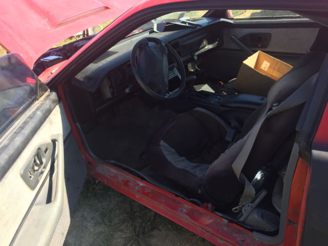 1990 Red Pontiac Firebird Hatchback