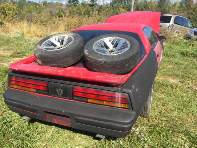 1990 Red Pontiac Firebird Hatchback