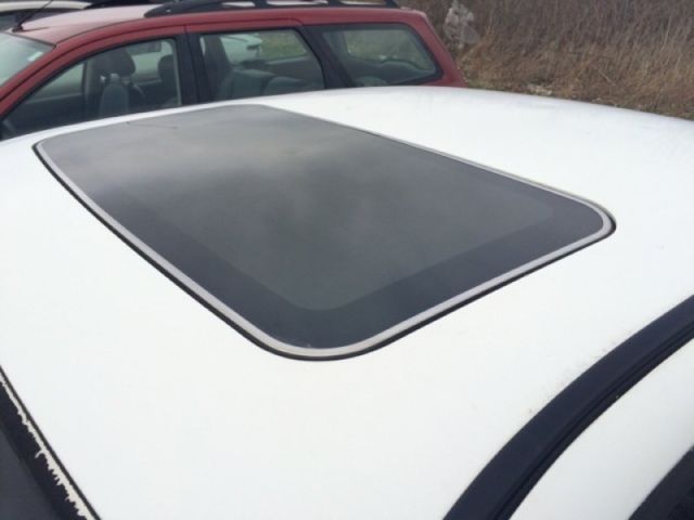 1990 White Ford Thunderbird Coupe