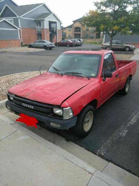 1990 Red Toyota Pickup Standard Cab Pickup