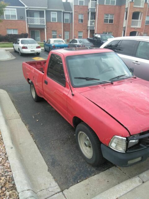 1990 Red Toyota Pickup Standard Cab Pickup