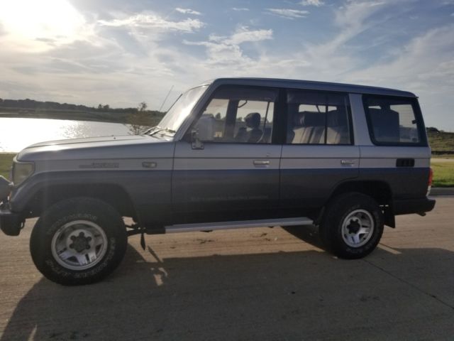 1990 Silver/Blue Toyota Land Cruiser SUV