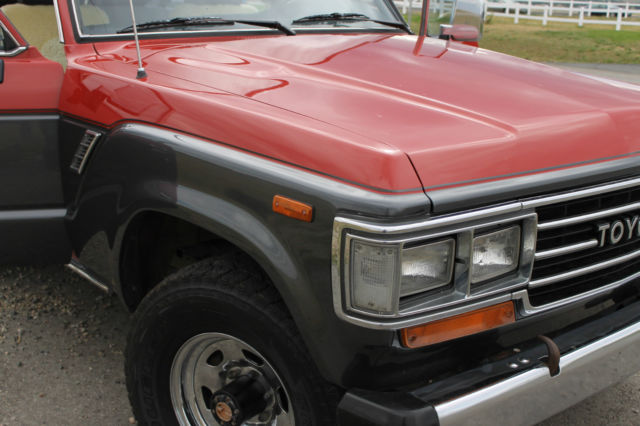 1990 Red/Silver Toyota Land Cruiser SUV