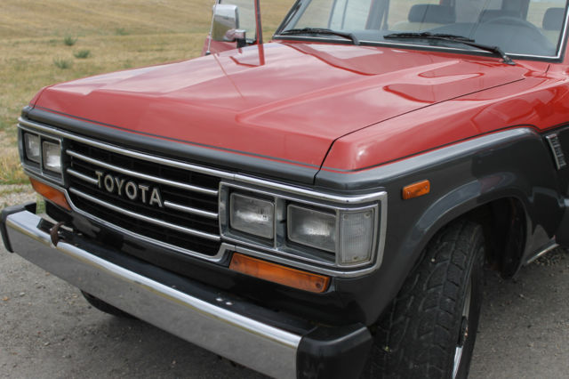 1990 Red/Silver Toyota Land Cruiser SUV