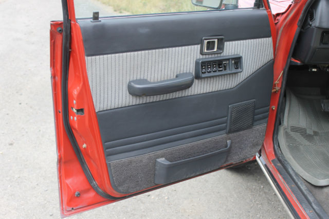 1990 Red/Silver Toyota Land Cruiser SUV