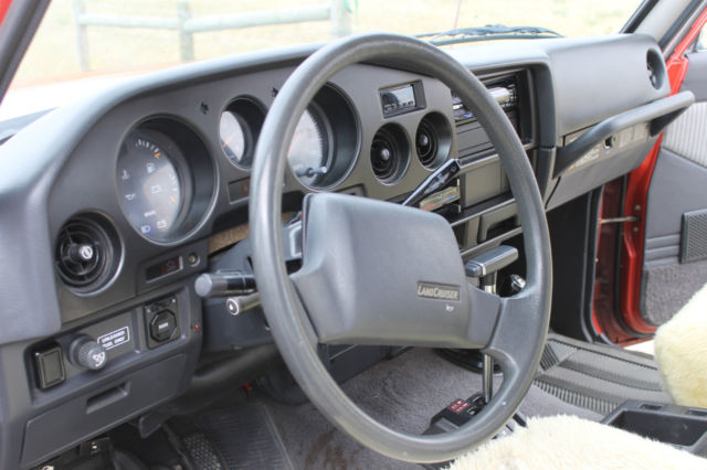 1990 Red/Silver Toyota Land Cruiser SUV