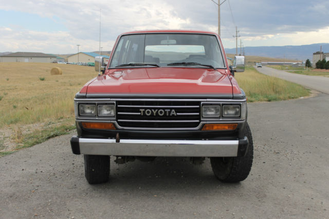 1990 Red/Silver Toyota Land Cruiser SUV