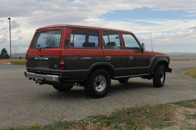 1990 Red/Silver Toyota Land Cruiser SUV