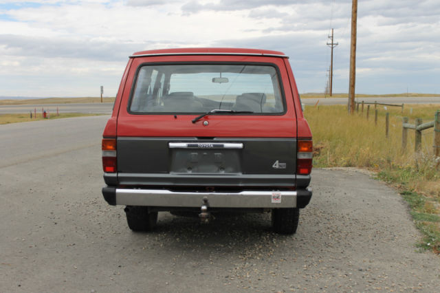 1990 Red/Silver Toyota Land Cruiser SUV