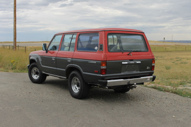 1990 Red/Silver Toyota Land Cruiser SUV