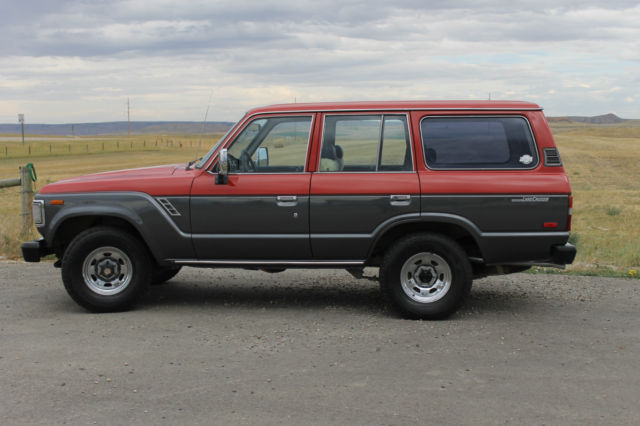1990 Red/Silver Toyota Land Cruiser SUV