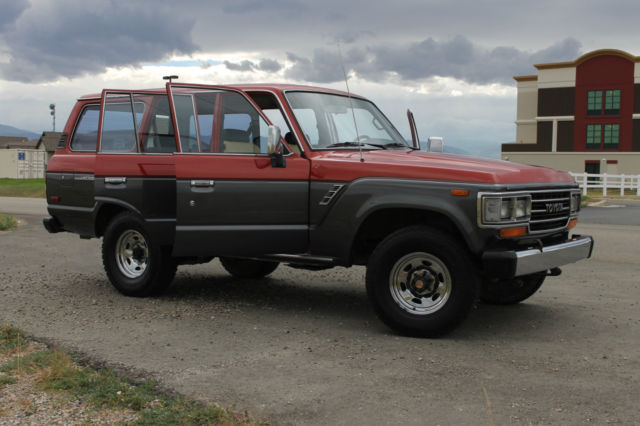 1990 Red/Silver Toyota Land Cruiser SUV