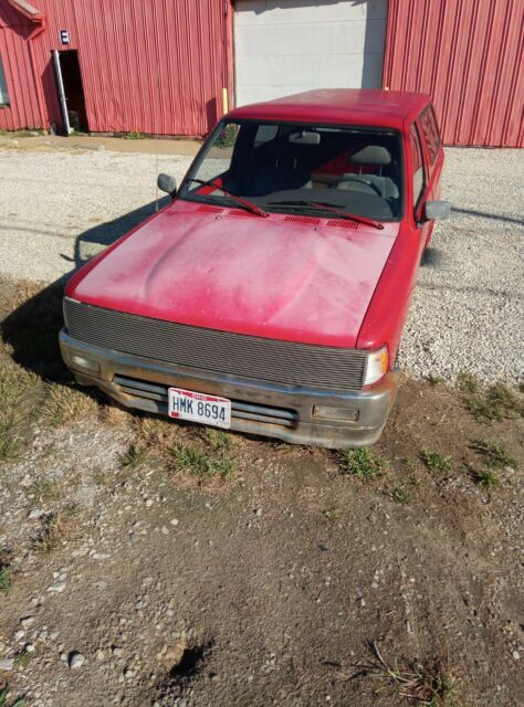 1990 Red Toyota Pickup