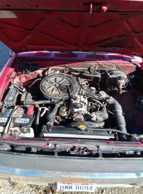 1990 Red Toyota Pickup