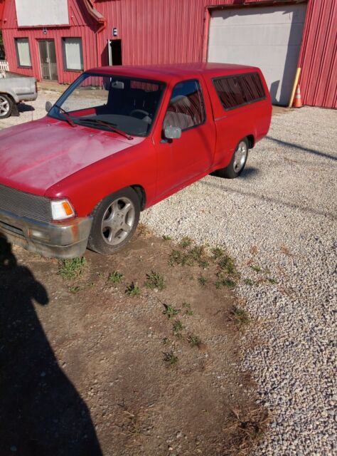 1990 Red Toyota Pickup