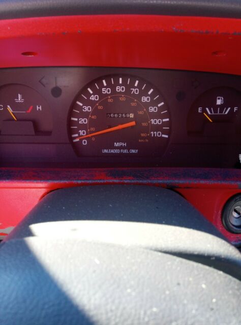 1990 Red Toyota Pickup
