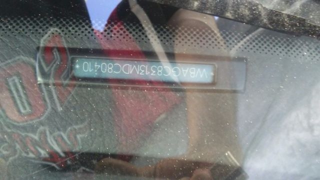 1991 White BMW 7-Series Sedan