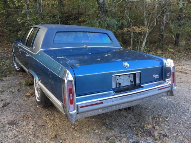 1991 Blue Cadillac Brougham Sedan