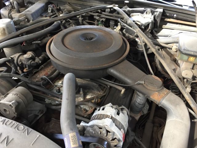 1991 Blue Cadillac Brougham Sedan