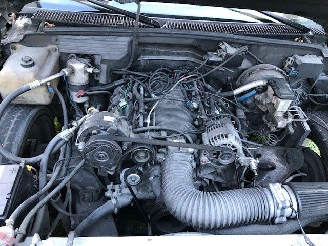 1991 satin black Chevrolet C-10 Pickup