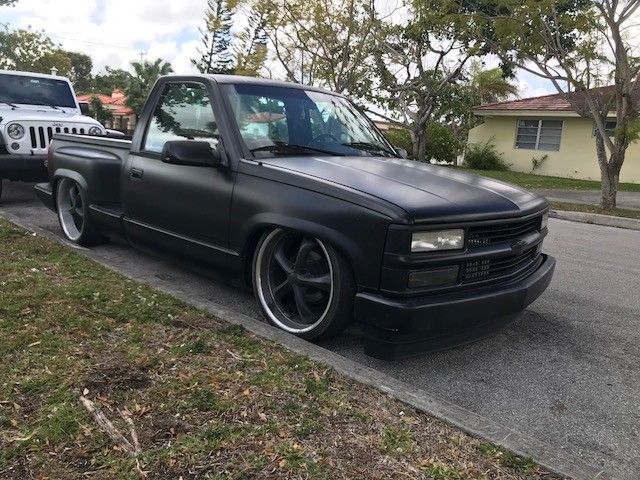 1991 satin black Chevrolet C-10 Pickup