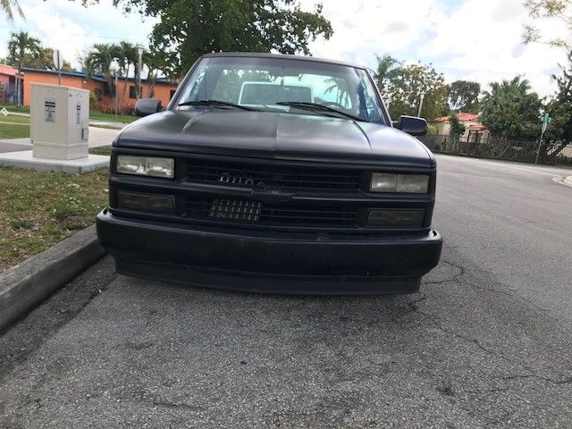 1991 satin black Chevrolet C-10 Pickup