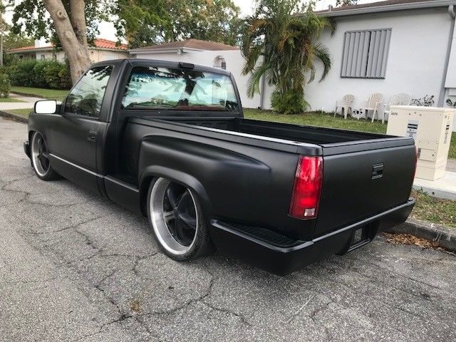 1991 satin black Chevrolet C-10 Pickup