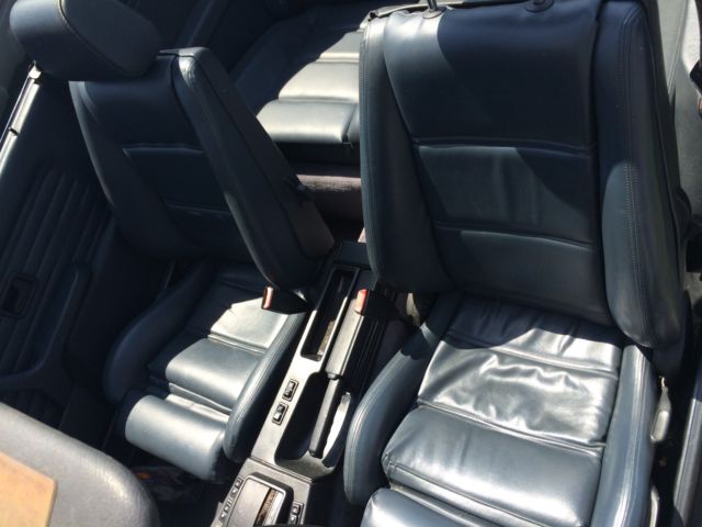 1991 light blue BMW 3-Series Convertible