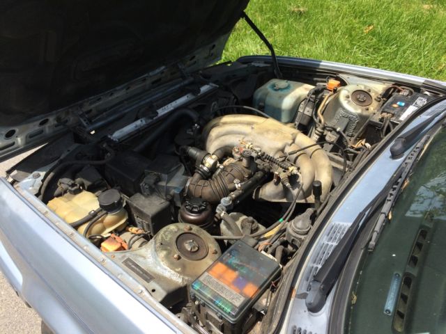 1991 light blue BMW 3-Series Convertible