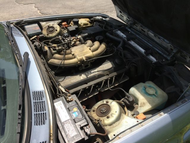 1991 light blue BMW 3-Series Convertible