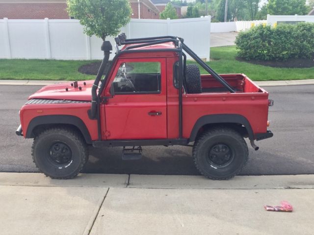1991 Red Land Rover Defender SUV